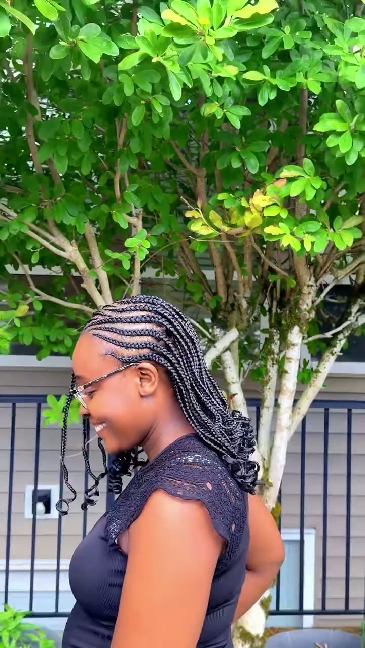 Feed-in cornrows braided straight back into long braids